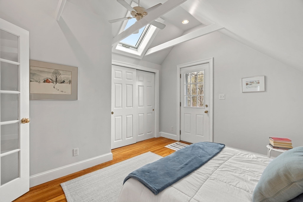 3 Circle Street, Unit 3 Marblehead, MA 01945 - Photo 16 of 23 a bedroom with a bed dresser and a window