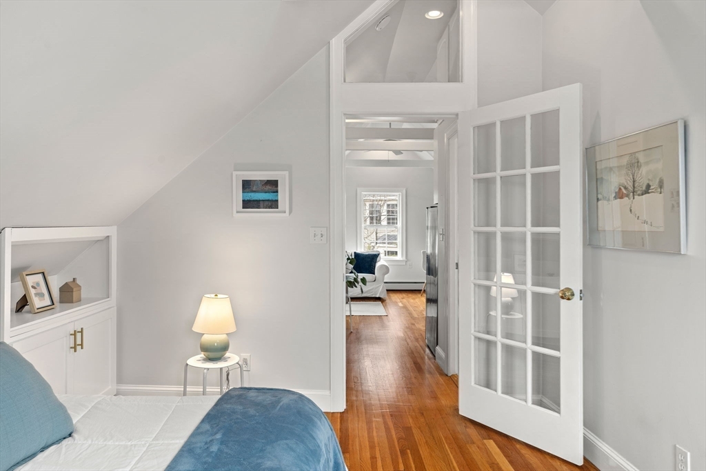 3 Circle Street, Unit 3 Marblehead, MA 01945 - Photo 19 of 23 a living room with furniture and a table