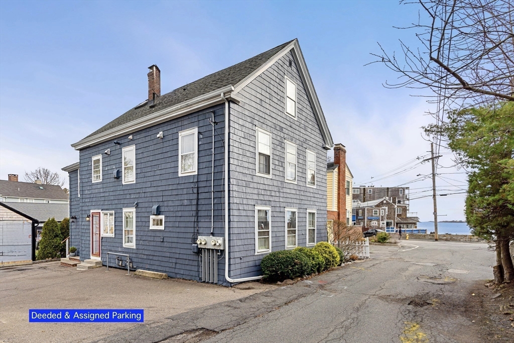 3 Circle Street, Unit 3 Marblehead, MA 01945 - Photo 20 of 23 a front view of a house with a garden