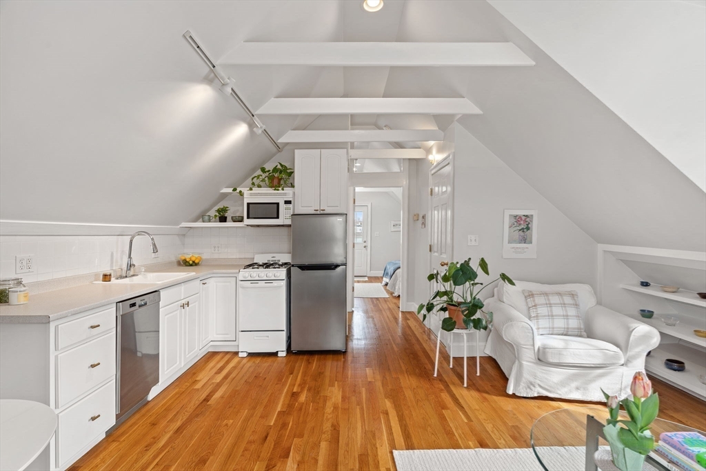 3 Circle Street, Unit 3 Marblehead, MA 01945 - Photo 7 of 23 a kitchen with a sink and refrigerator