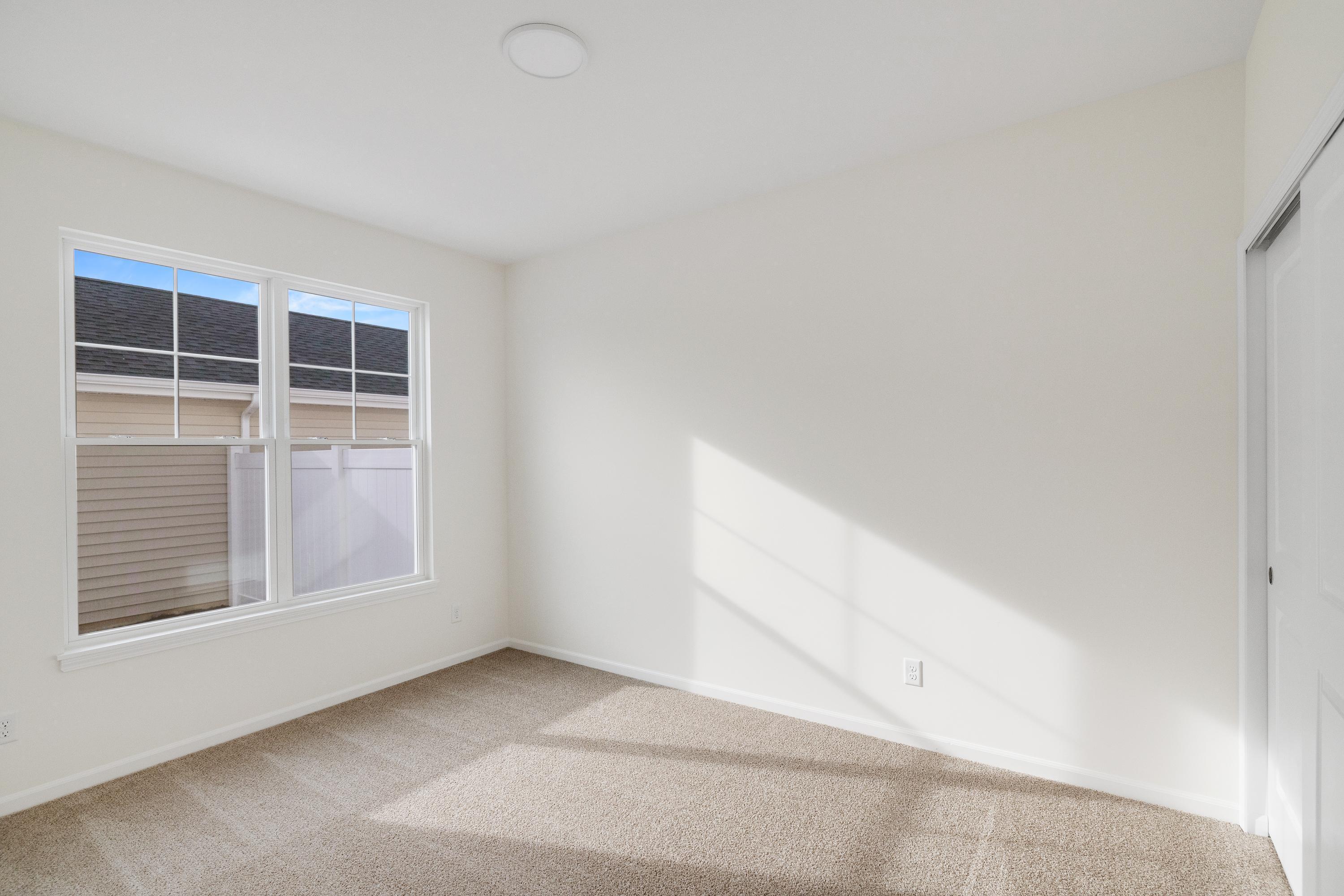 6141 Rushing Avenue Portage, IN 46368 - Photo 12 of 16 a view of an empty room with a window
