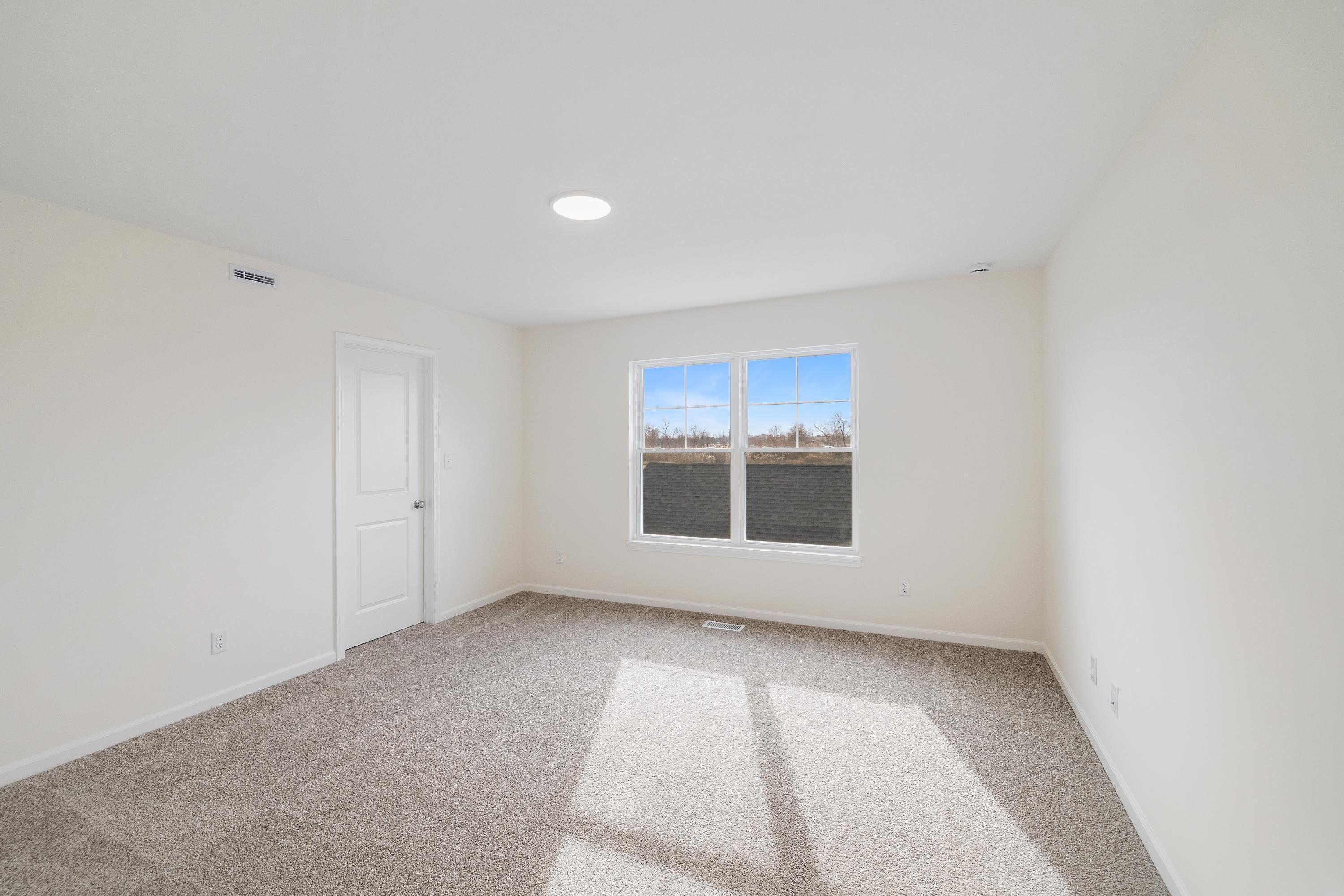 6141 Rushing Avenue Portage, IN 46368 - Photo 9 of 16 an empty room with a empty space and windows