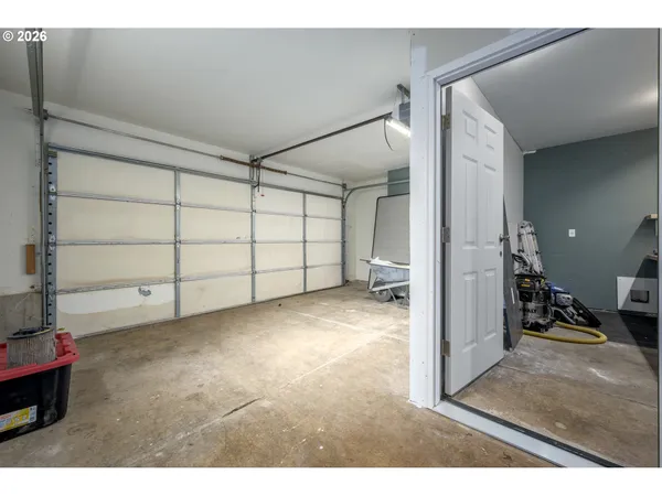 a view of a livingroom with closet and a window