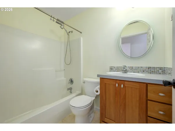 a view of a chairs and table in patio