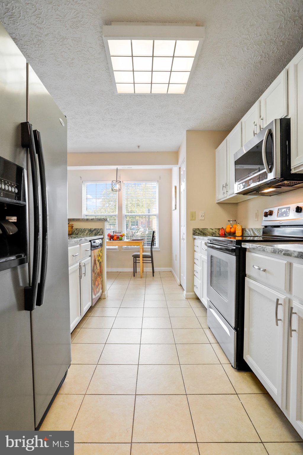 2445 Blue Spring Court, Unit 101 Odenton, MD 21113 - Photo 30 of 45 Kitchen with Stainless Steel Appliances
