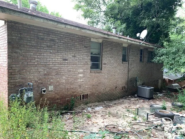 a backyard of a house with lots of green space