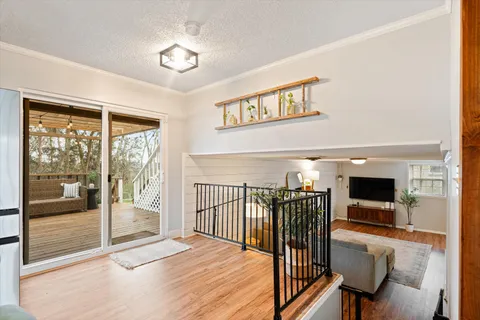 a view of a hallway with a livingroom