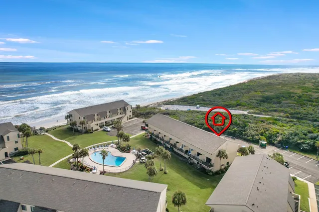 a view of a street with an ocean view