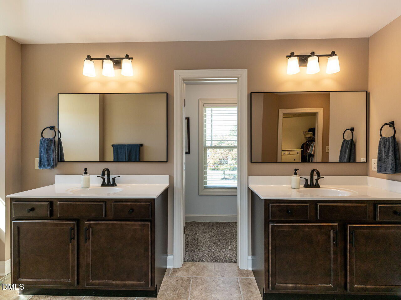 742 Adams Point Drive Garner, NC 27529 - Photo 14 of 31 a bathroom with a sink and a mirror