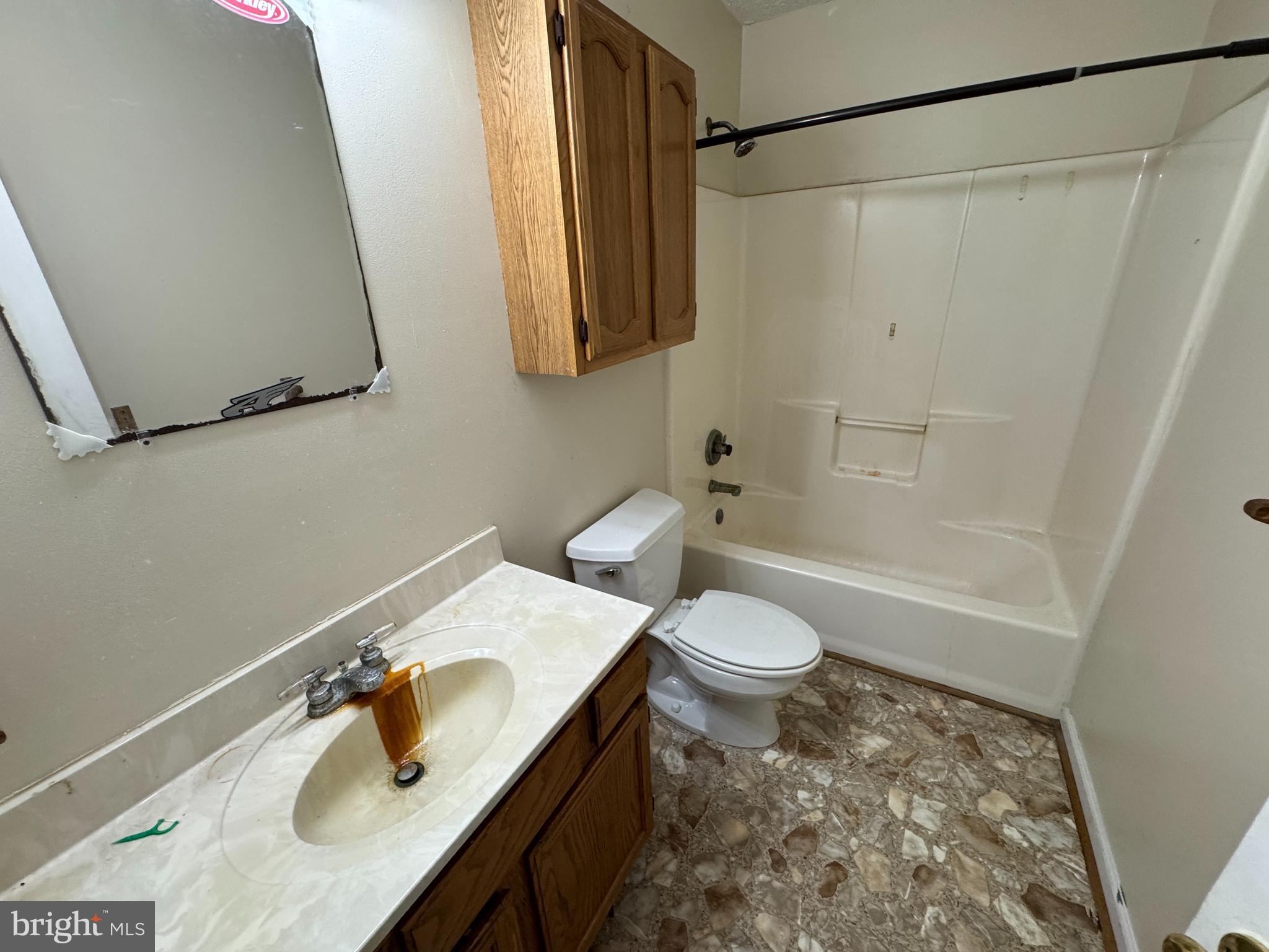 8922 Carpers Pike Yellow Spring, WV 26865 - Photo 12 of 23 a bathroom with a sink toilet and shower