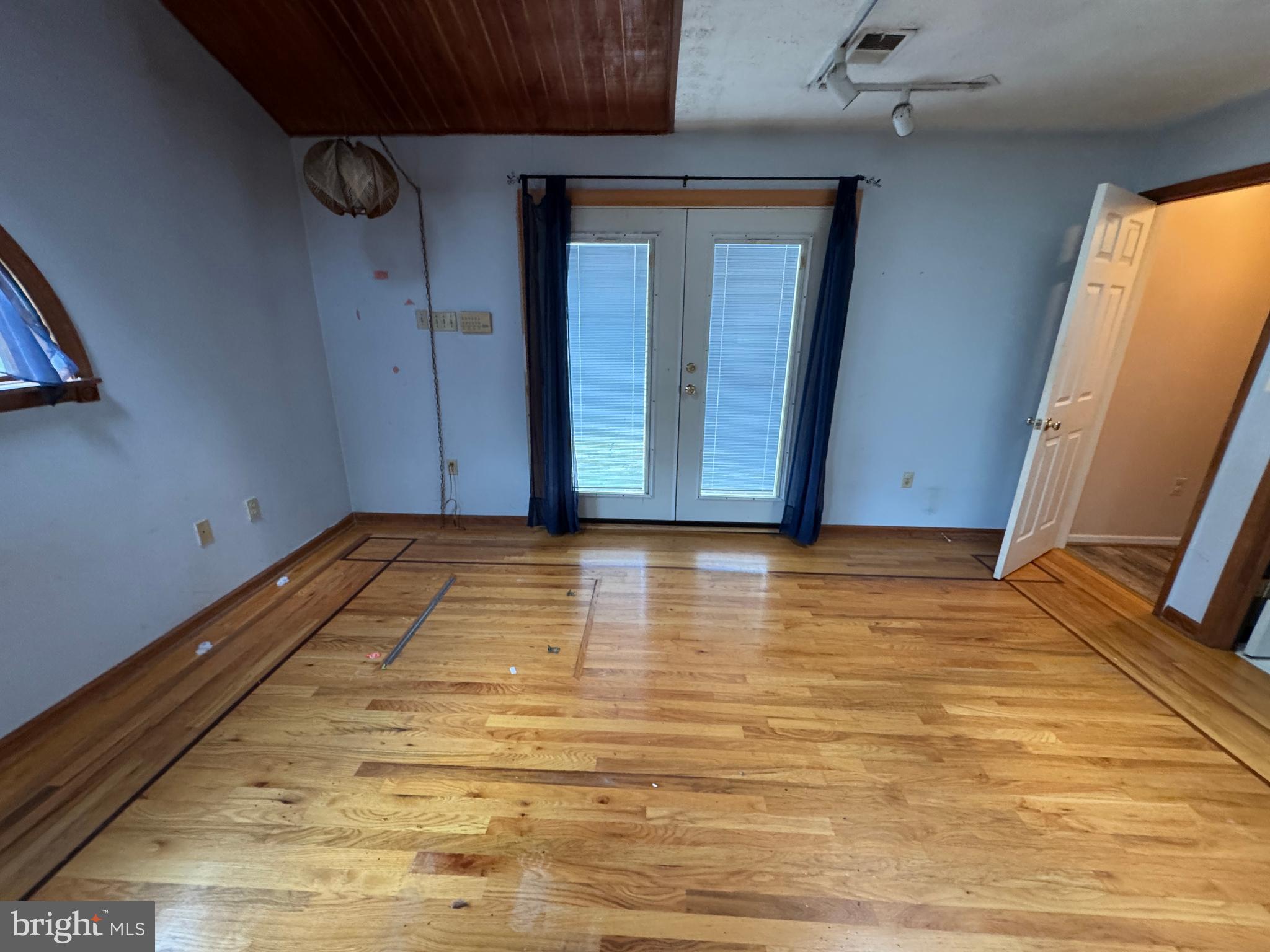 8922 Carpers Pike Yellow Spring, WV 26865 - Photo 18 of 23 a view of room with wooden floor