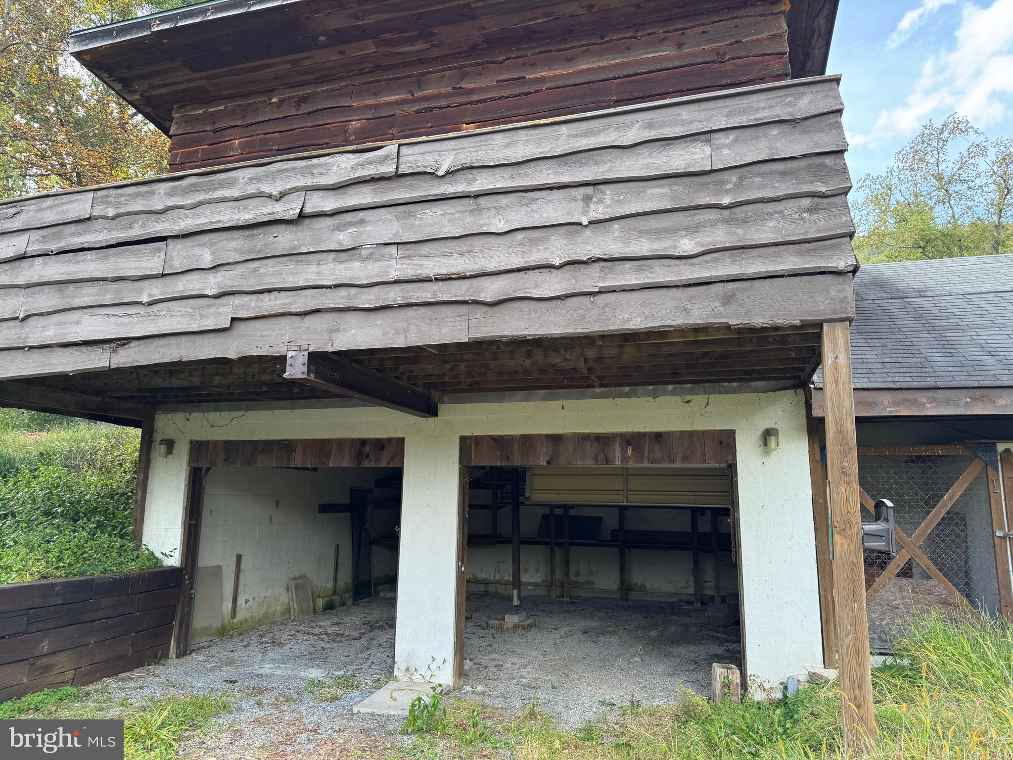 8922 Carpers Pike Yellow Spring, WV 26865 - Photo 21 of 23 a front view of a house with a porch