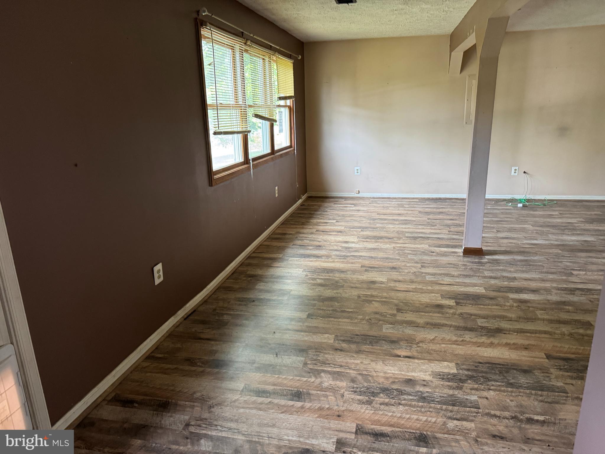 8922 Carpers Pike Yellow Spring, WV 26865 - Photo 5 of 23 a view of a room with wooden floor and window