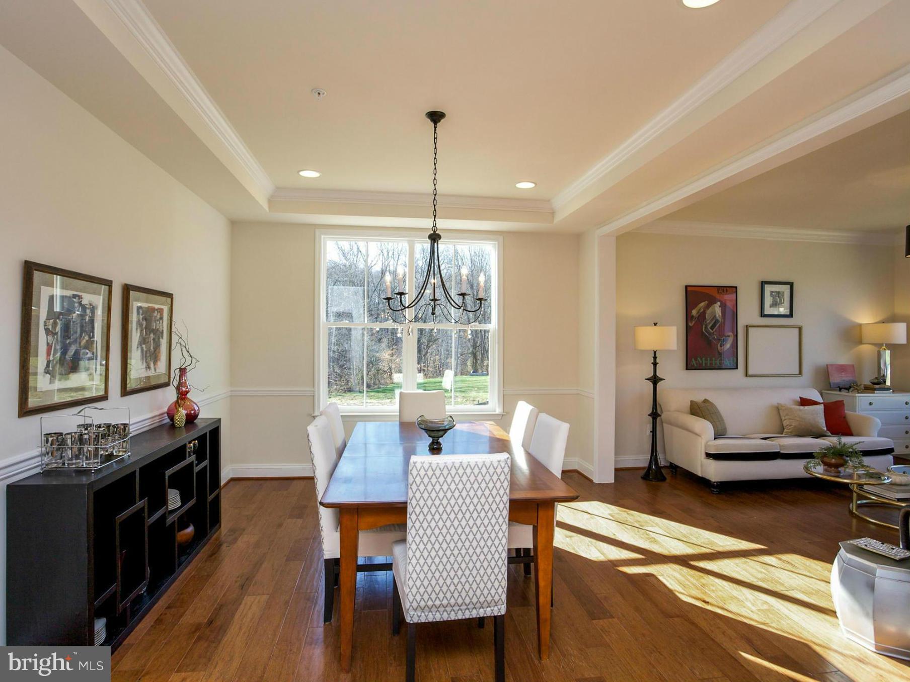 12504 Regwood Road Hydes, MD 21082 - Photo 10 of 28 a living room with furniture and a flat screen tv