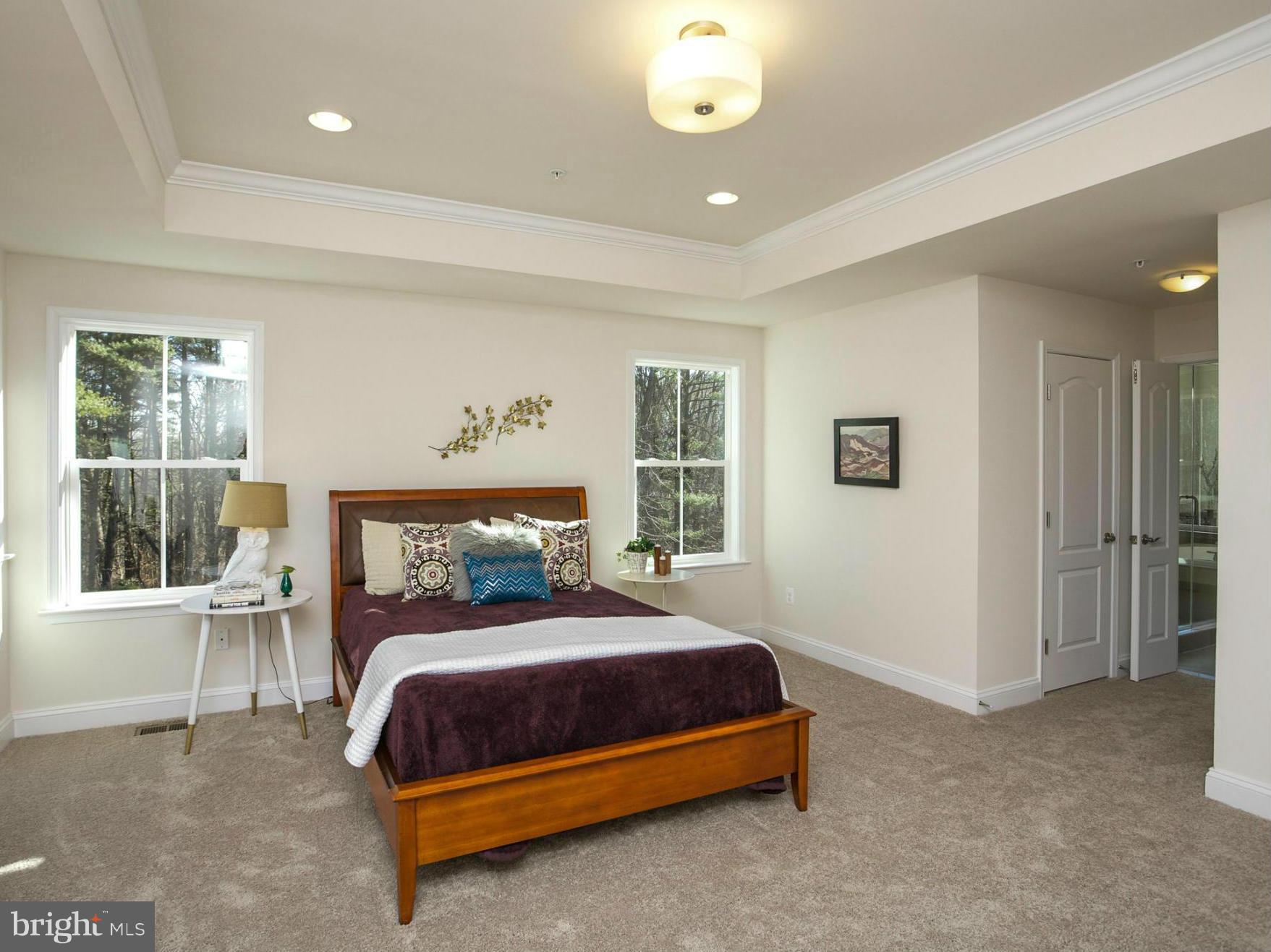 12504 Regwood Road Hydes, MD 21082 - Photo 18 of 28 a bedroom with a bed and a window