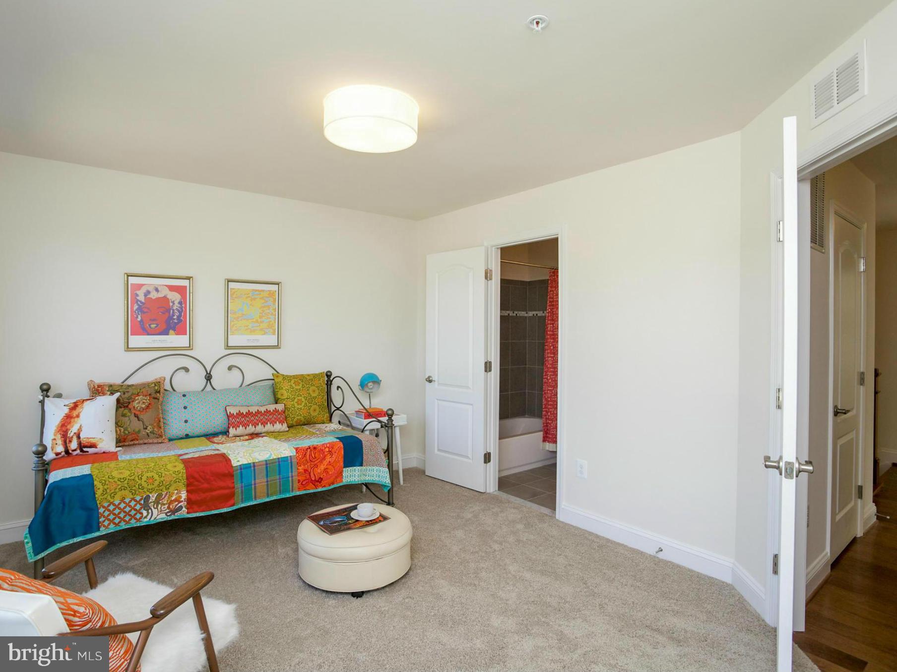 12504 Regwood Road Hydes, MD 21082 - Photo 22 of 28 a living room with furniture and a window