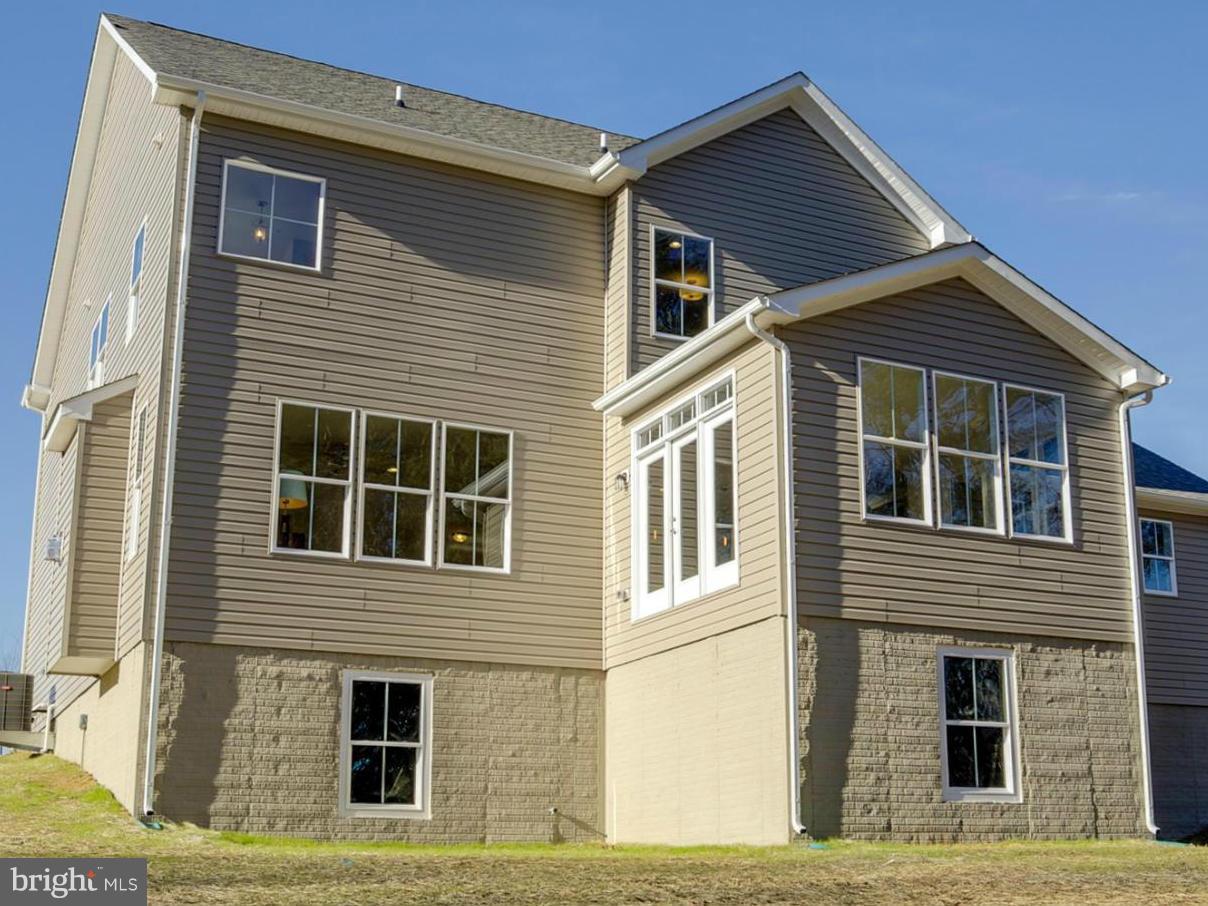 12504 Regwood Road Hydes, MD 21082 - Photo 26 of 28 a front view of a house with balcony