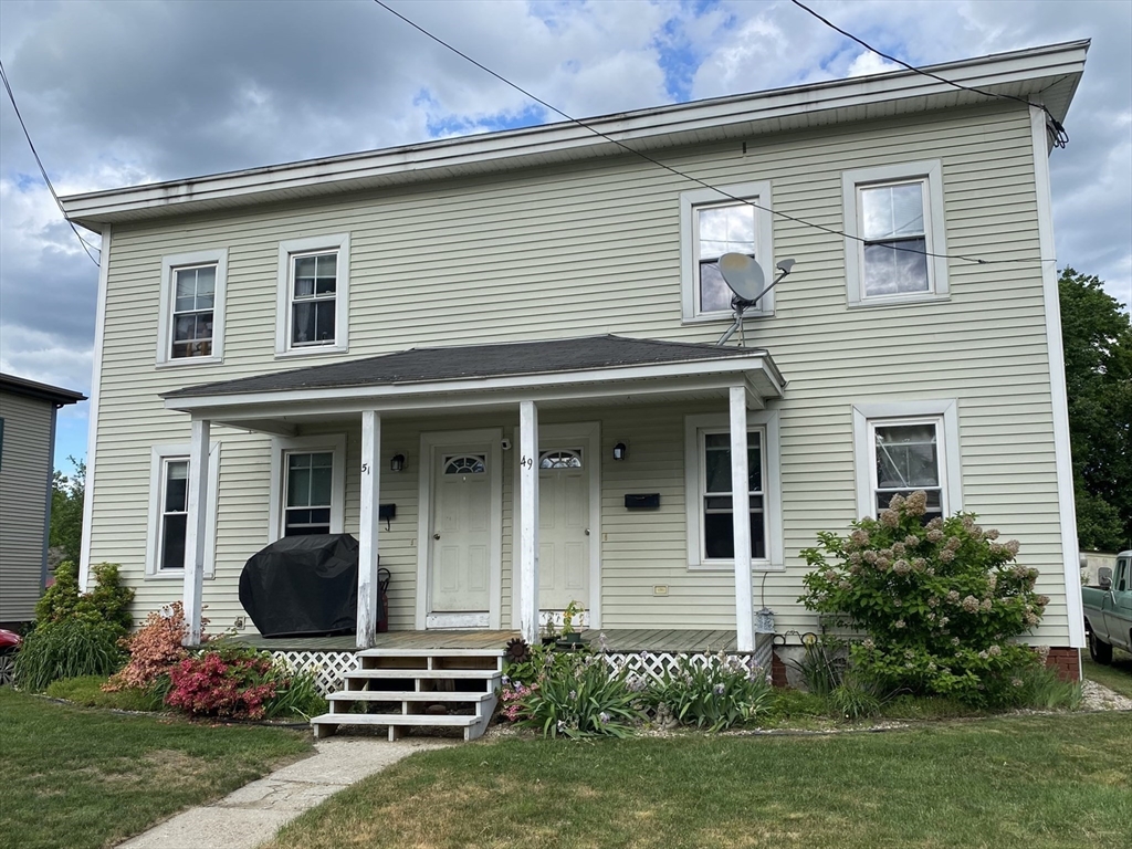 49-51 North Street Three Rivers, MA 01080 - Photo 1 of 21 a front view of a house with garden