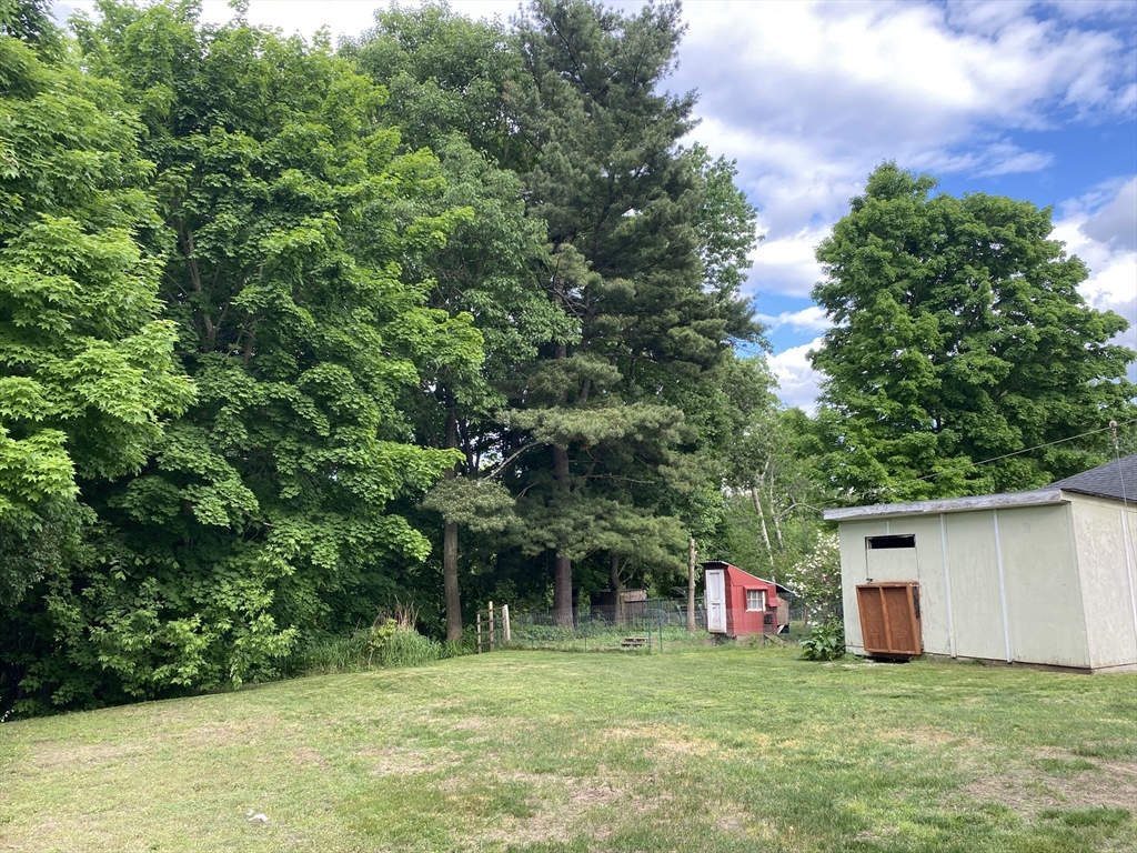 49-51 North Street Three Rivers, MA 01080 - Photo 3 of 21 a view of an outdoor space and a yard