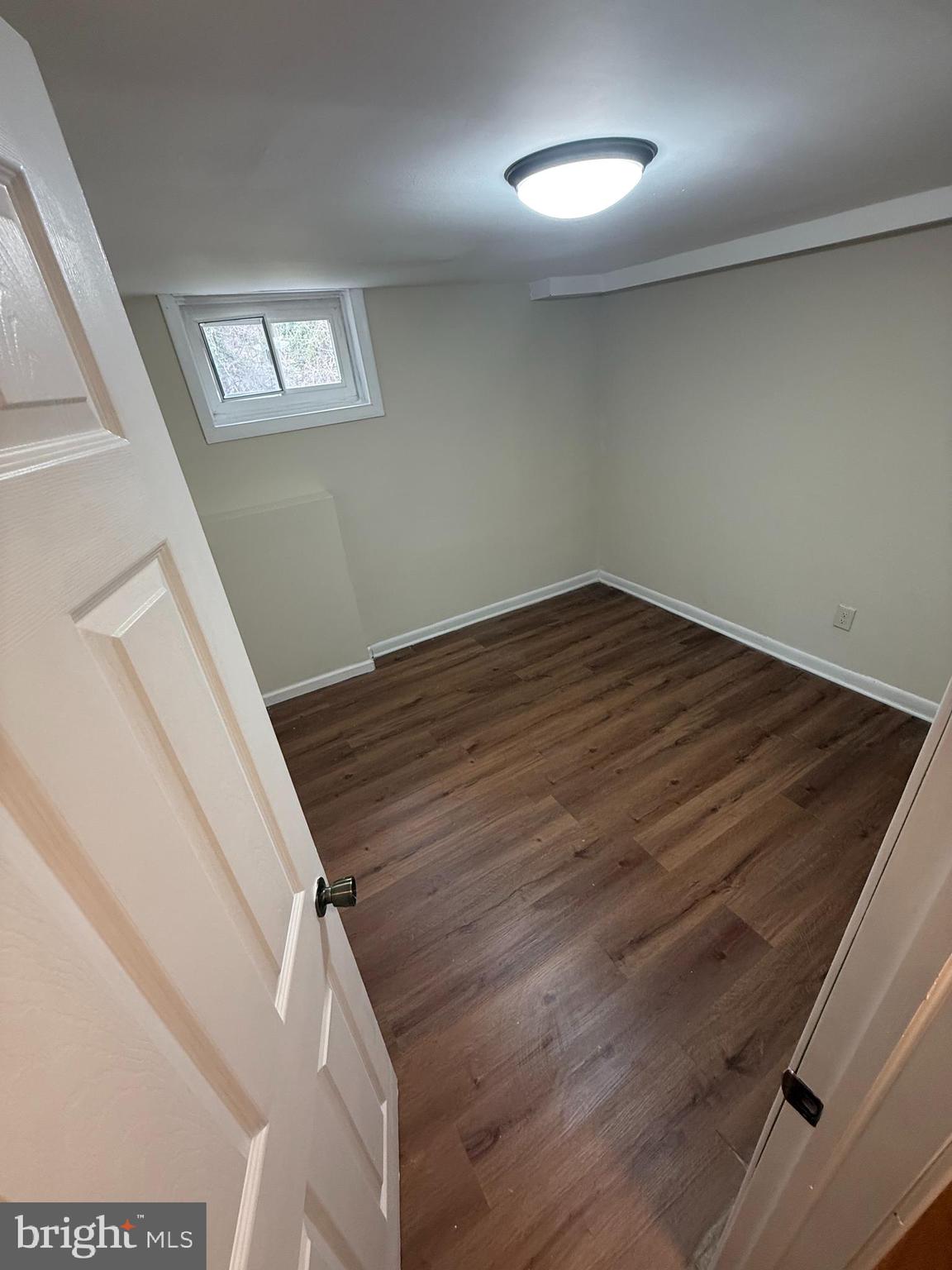 528 Random Road Baltimore, MD 21229 - Photo 11 of 24 Downstairs Bedroom