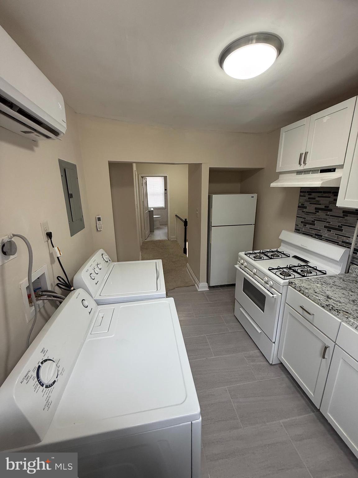 528 Random Road Baltimore, MD 21229 - Photo 20 of 24 Upstairs Kitchen/Laundry