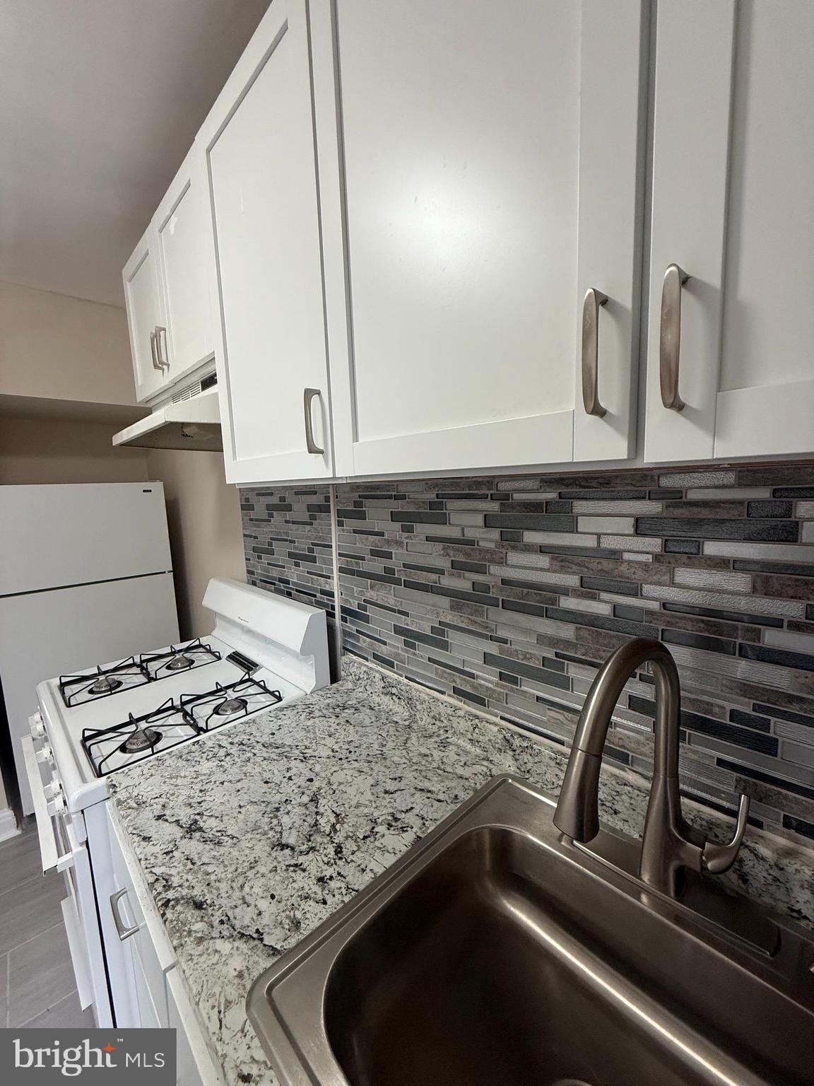 528 Random Road Baltimore, MD 21229 - Photo 21 of 24 Upstairs Kitchen