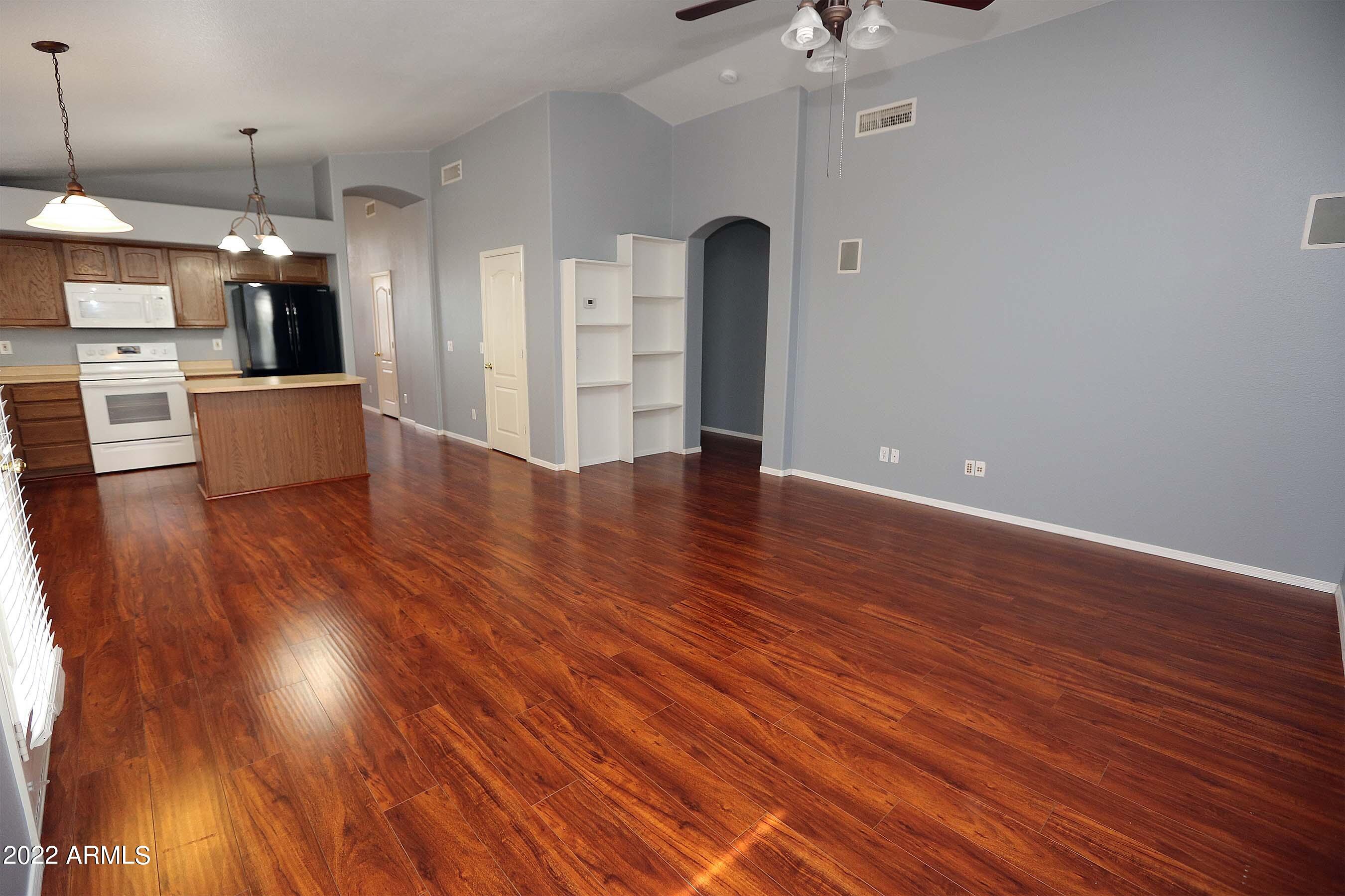 11217 West Edgemont Avenue Avondale, AZ 85392 - Photo 16 of 47 a view of a room with wooden floor