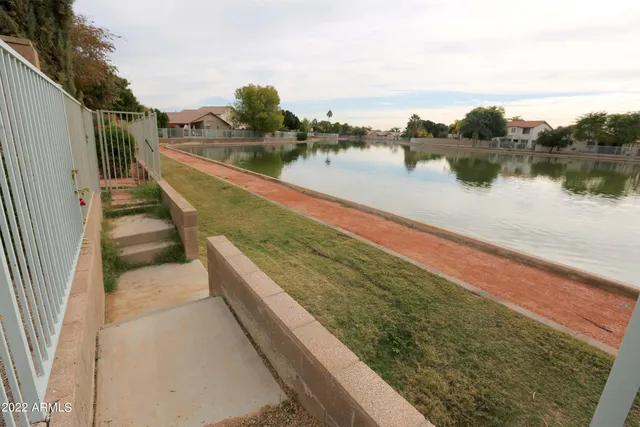 a view of a lake from a yard