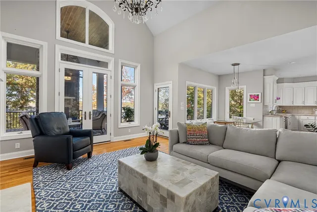 a living room with furniture or couch and a large window