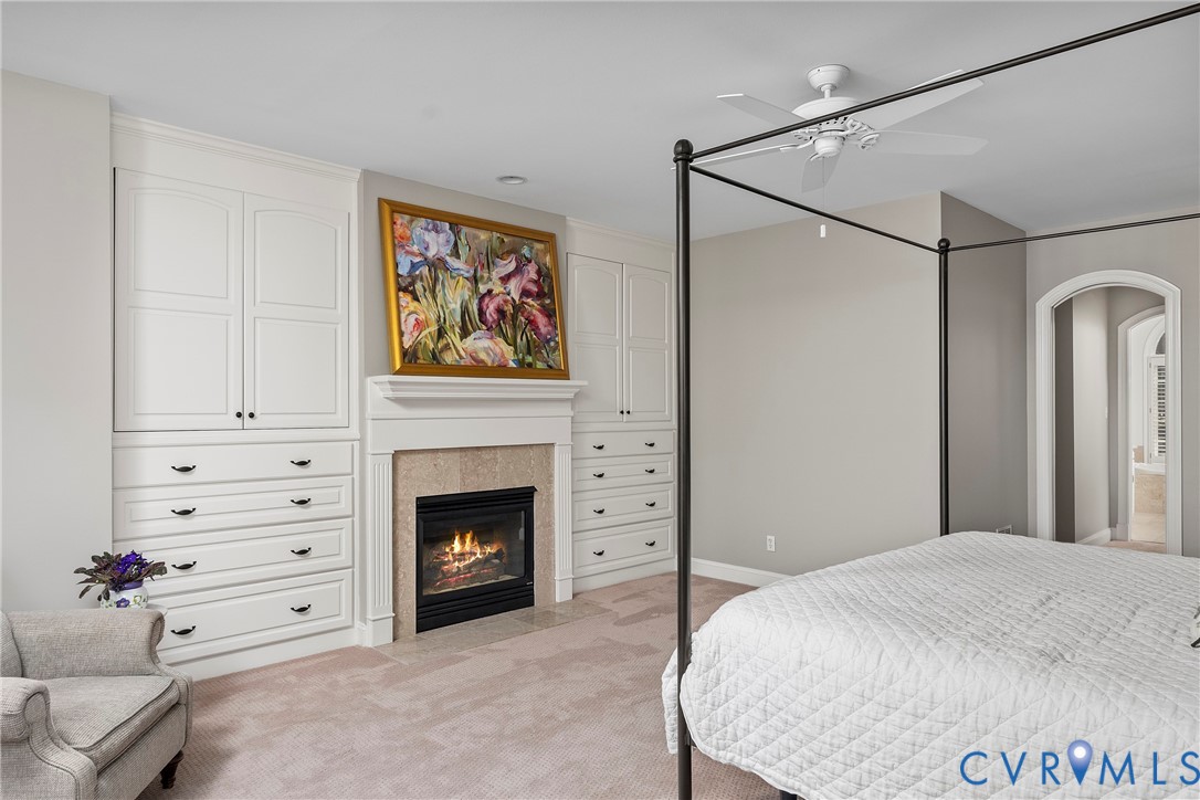 5304 Beechwood Point Court Midlothian, VA 23112 - Photo 29 of 50 a bed room with a bed and a fireplace
