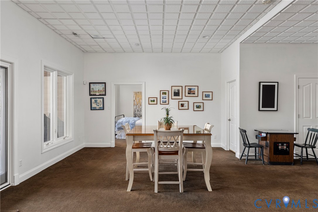 5304 Beechwood Point Court Midlothian, VA 23112 - Photo 38 of 50 a dining room with furniture and window