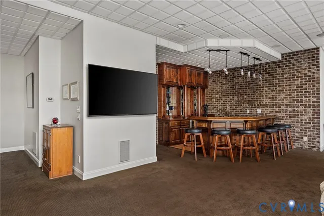 a view of a balcony with chairs