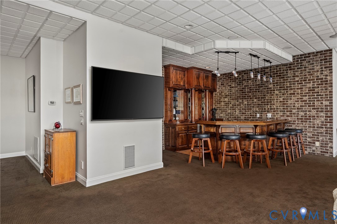 5304 Beechwood Point Court Midlothian, VA 23112 - Photo 39 of 50 a view of a livingroom with furniture and a flat screen tv