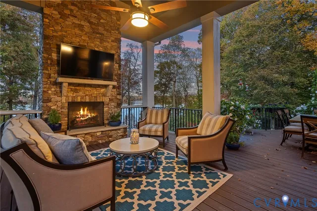 a outdoor living space with furniture and a fireplace