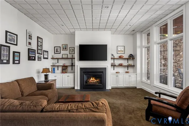 a bedroom with a bed and a tv