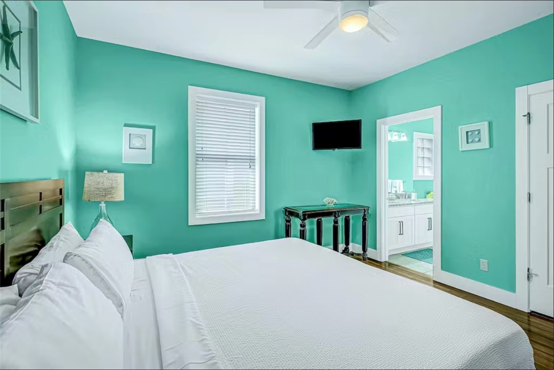 14307 Kemps Way Corpus Christi, TX 78418 - Photo 12 of 23 a bedroom with a bed and a window