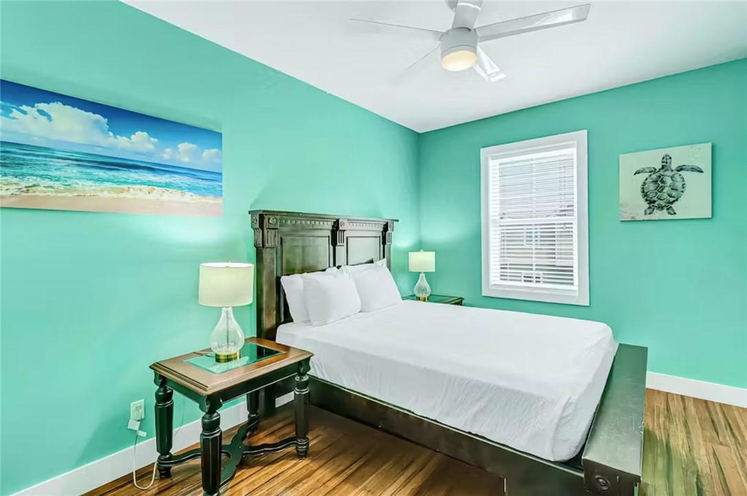 14307 Kemps Way Corpus Christi, TX 78418 - Photo 16 of 23 a bedroom with a bed table and chair