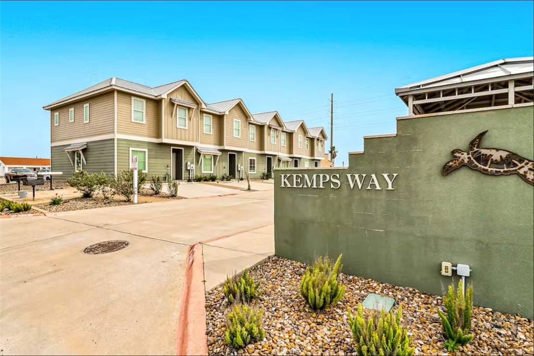 14307 Kemps Way Corpus Christi, TX 78418 - Photo 21 of 23 a view of a building with many windows