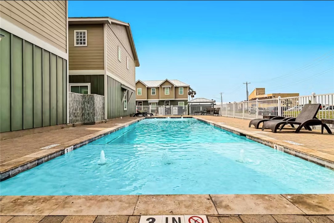 14307 Kemps Way Corpus Christi, TX 78418 - Photo 23 of 23 a front view of a house with garden