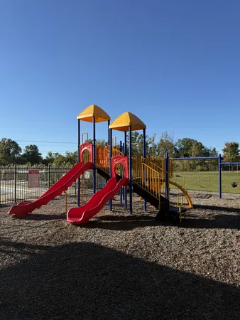 a view of a park with slide