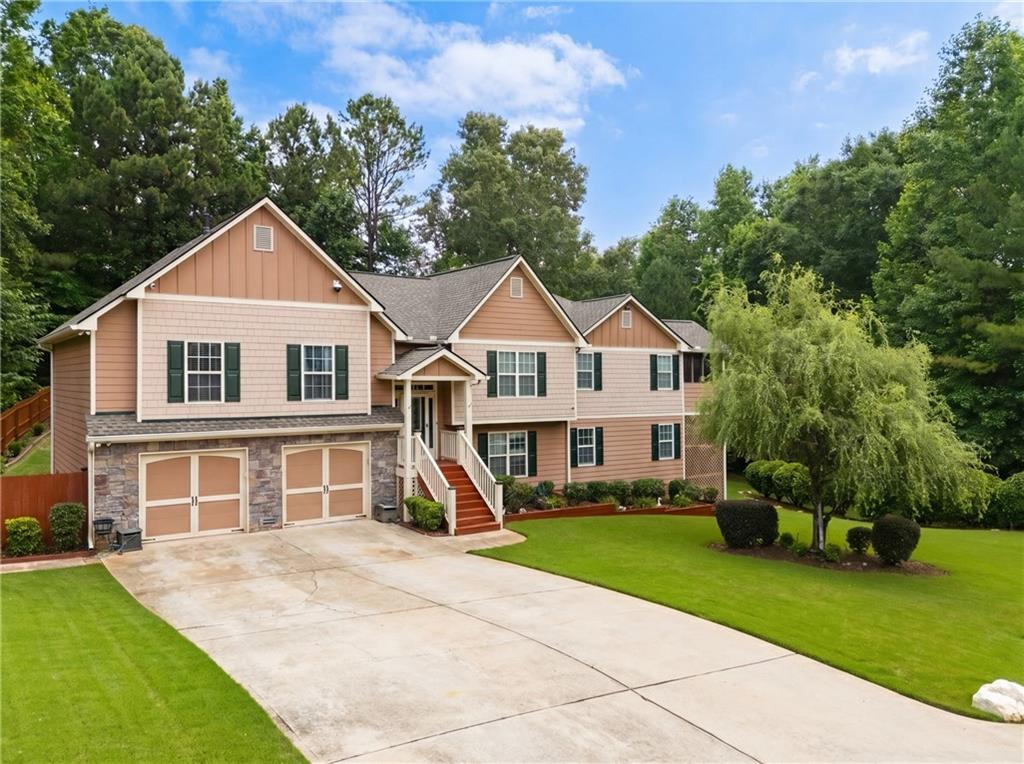 55 Meridian Point Dallas, GA 30132 - Photo 3 of 45 a front view of a house with a yard