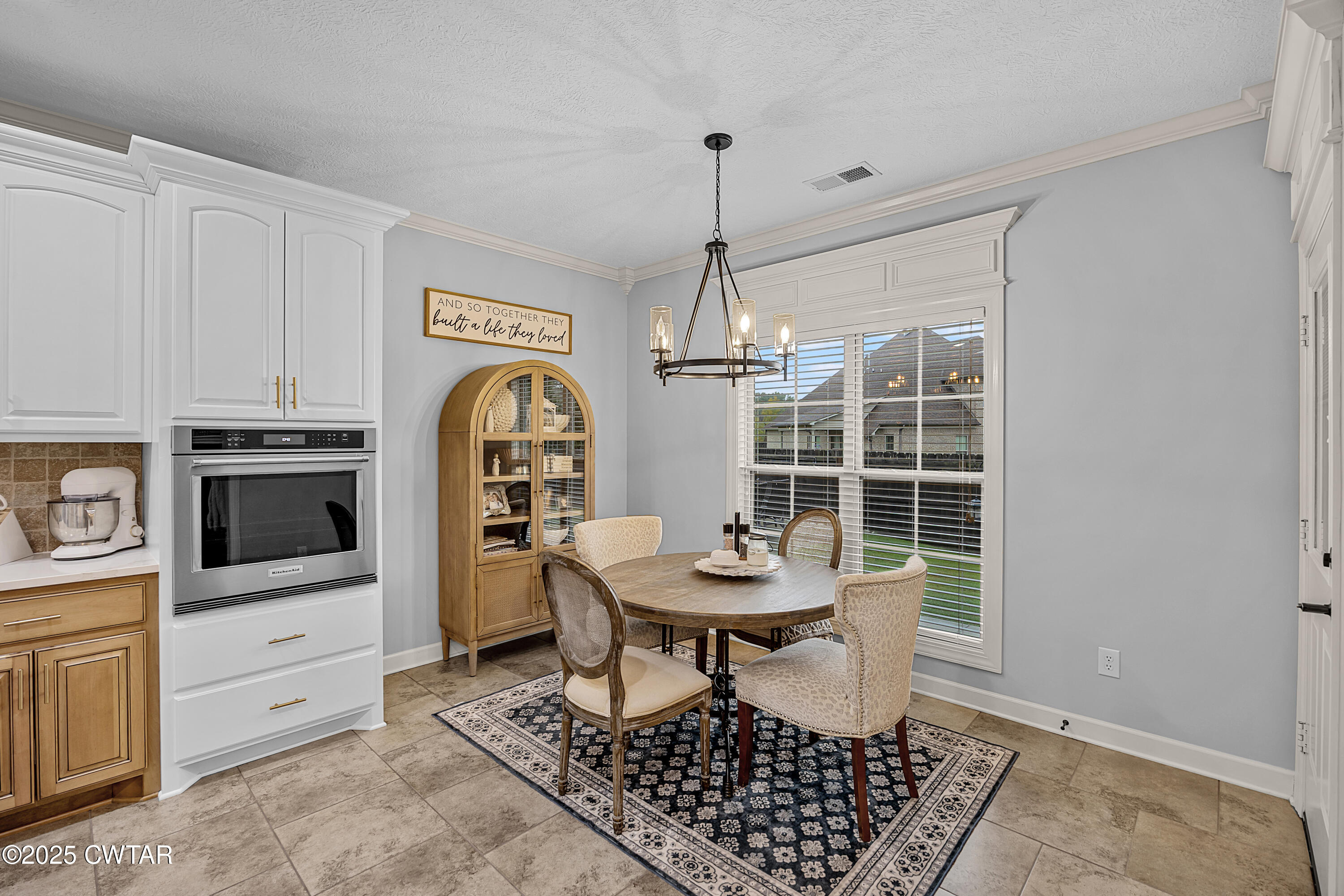 31 Perrington Cove Jackson, TN 38305 - Photo 14 of 27 a dining room with furniture and window