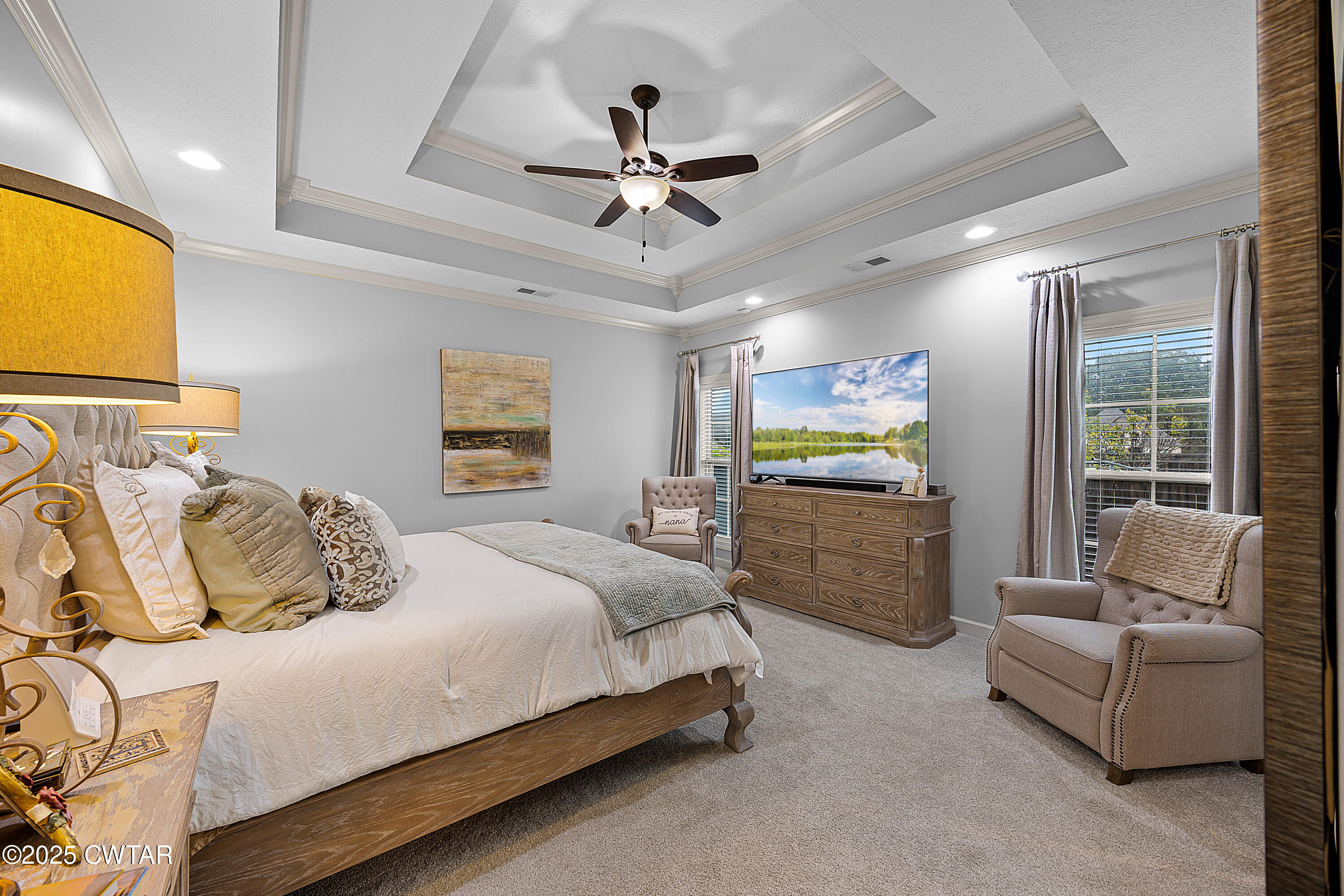 31 Perrington Cove Jackson, TN 38305 - Photo 21 of 27 a bedroom with a bed and a couch