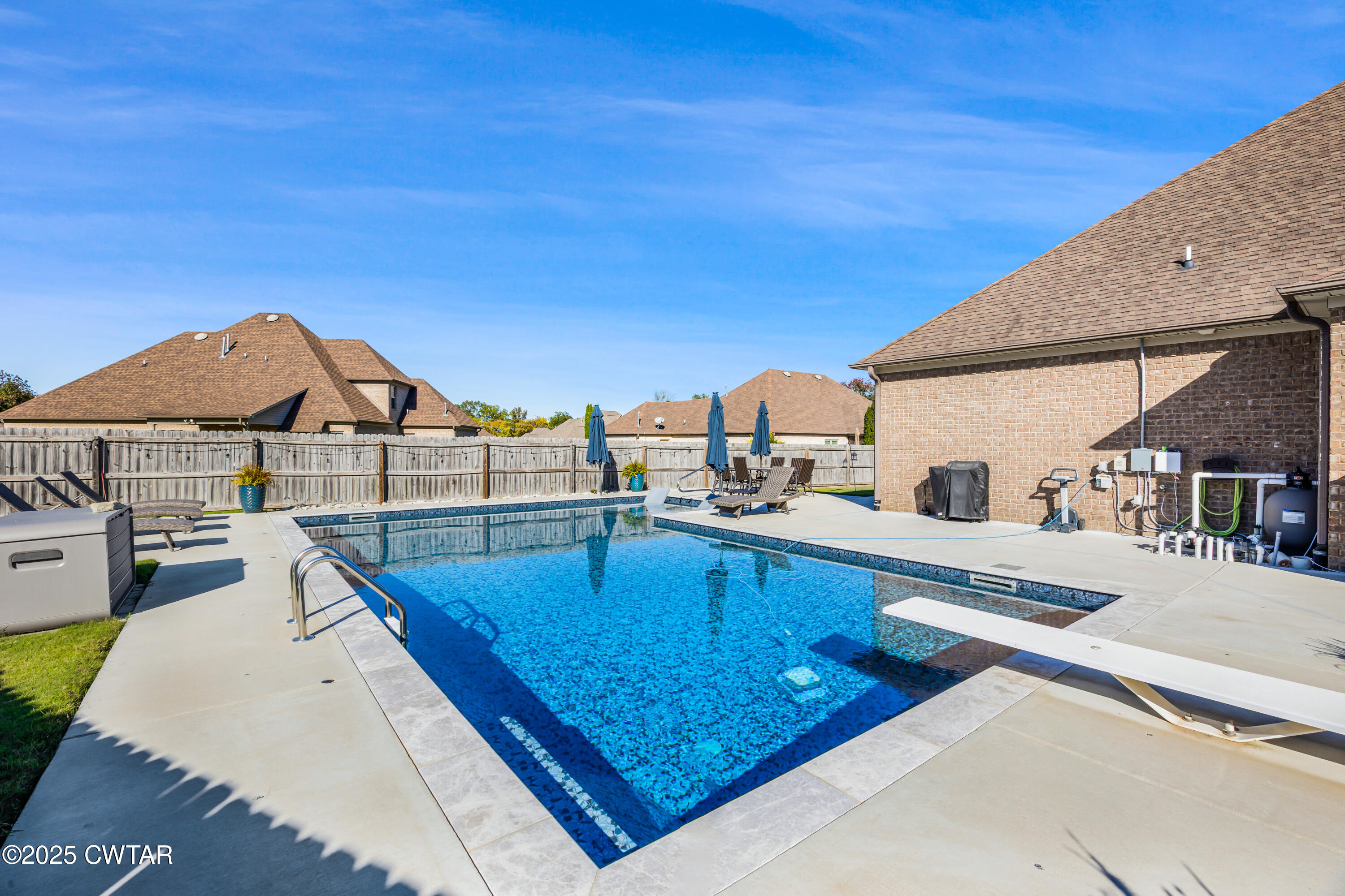 31 Perrington Cove Jackson, TN 38305 - Photo 26 of 27 a view of a swimming pool with a lounge chair