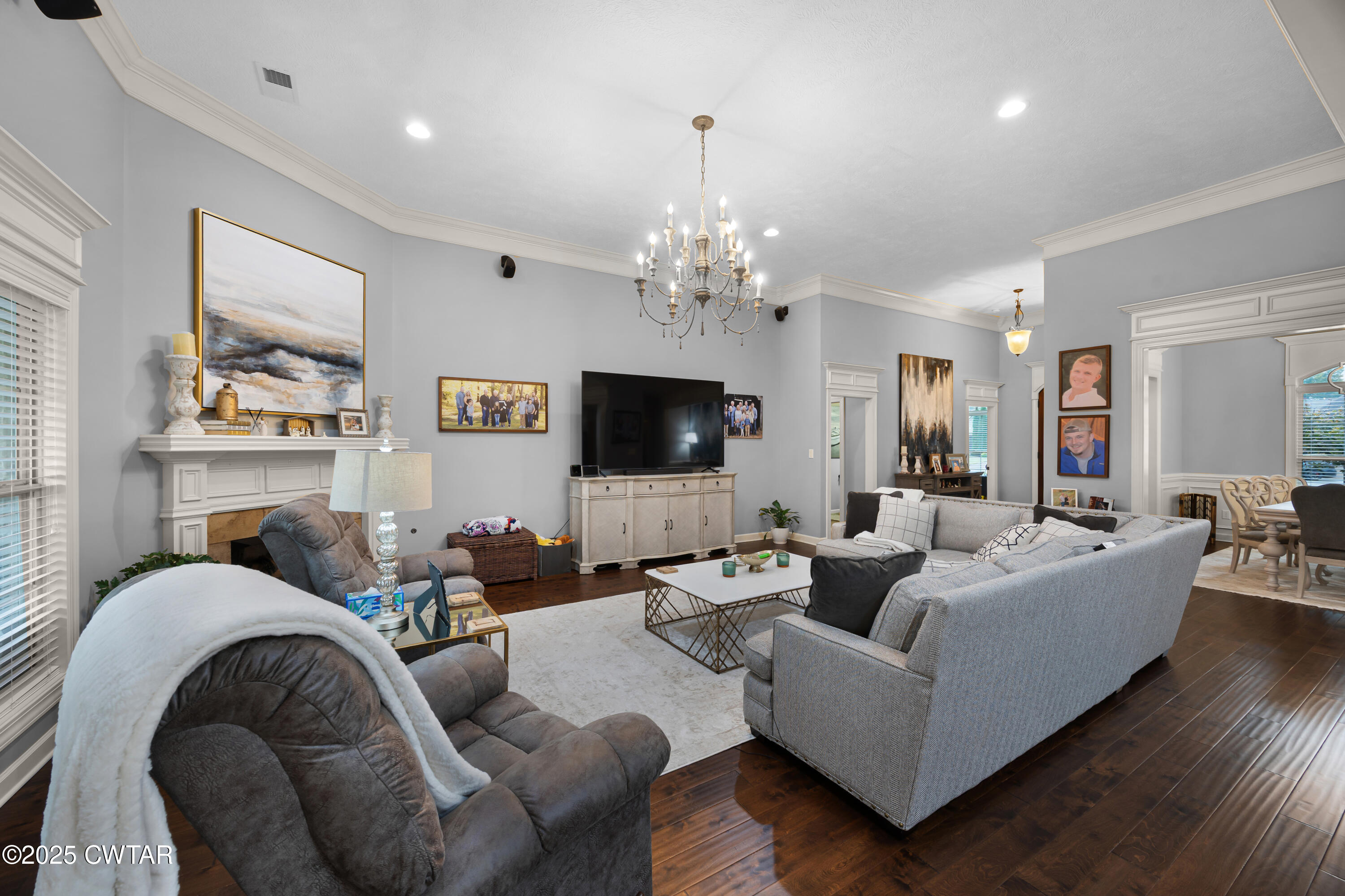 31 Perrington Cove Jackson, TN 38305 - Photo 6 of 27 a living room with furniture and a flat screen tv