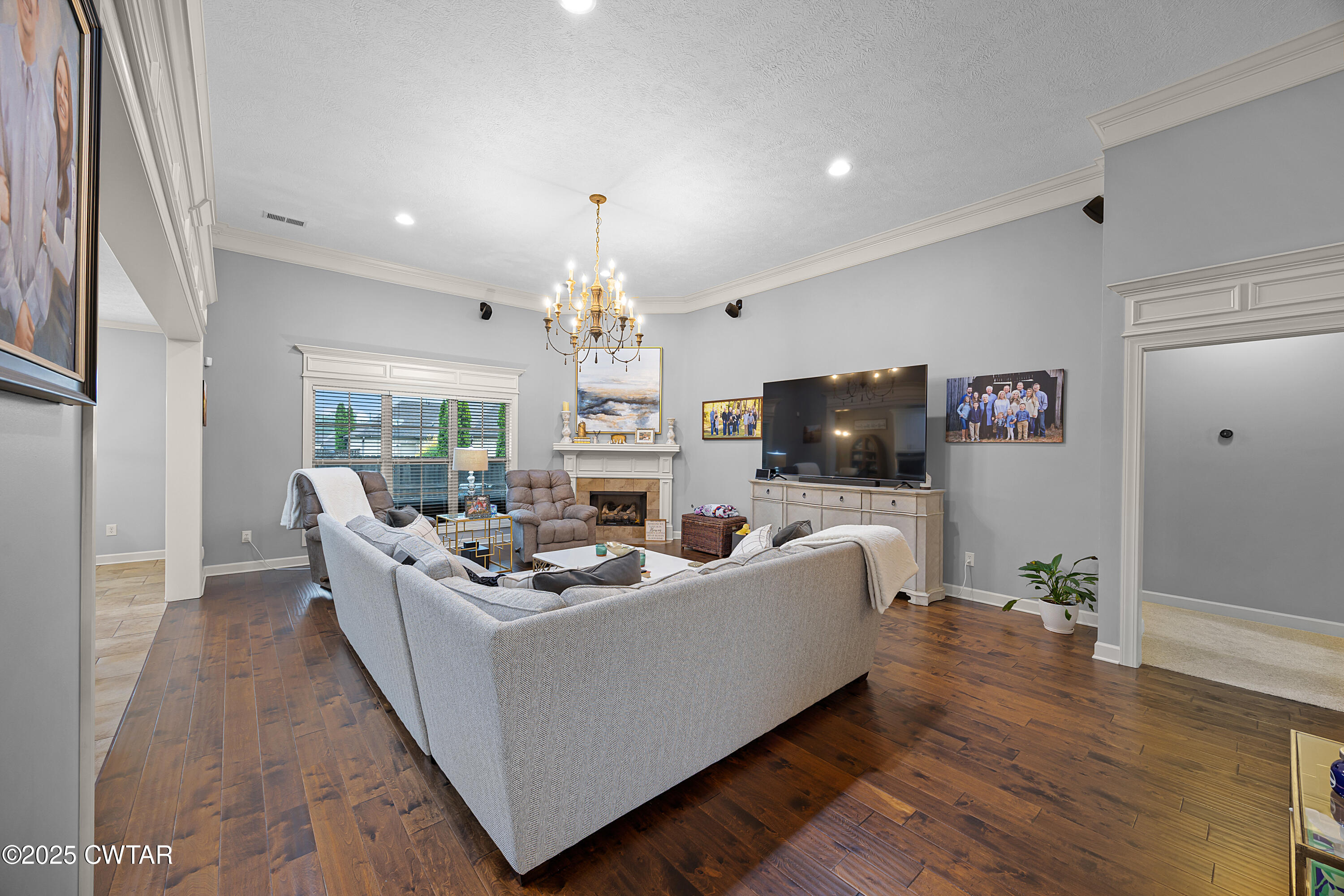 31 Perrington Cove Jackson, TN 38305 - Photo 7 of 27 a living room with furniture and a flat screen tv