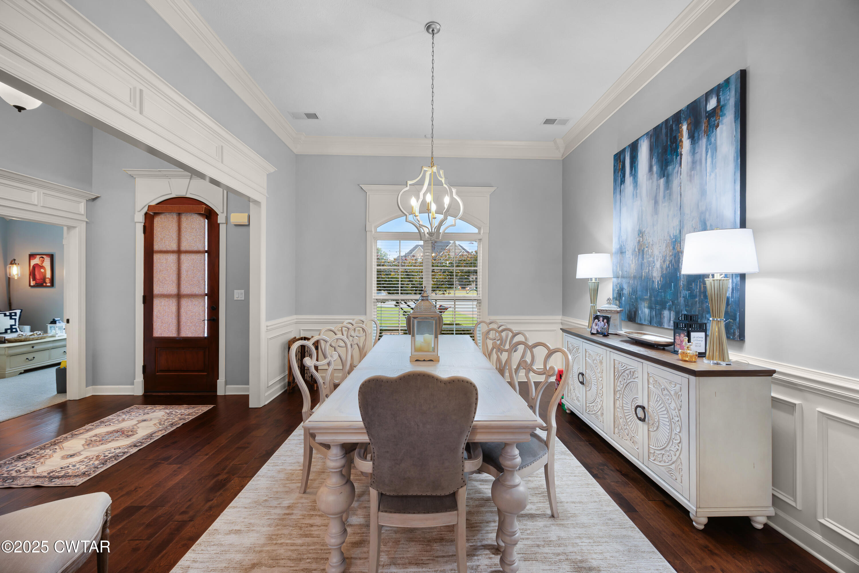 31 Perrington Cove Jackson, TN 38305 - Photo 9 of 27 a view of a dining room with furniture window and wooden floor