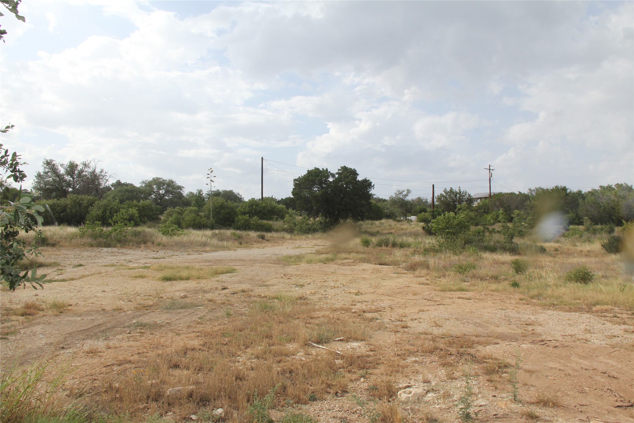 4715 Eck Lane Austin, TX 78734 - Photo 4 of 19 a view of lake with green field