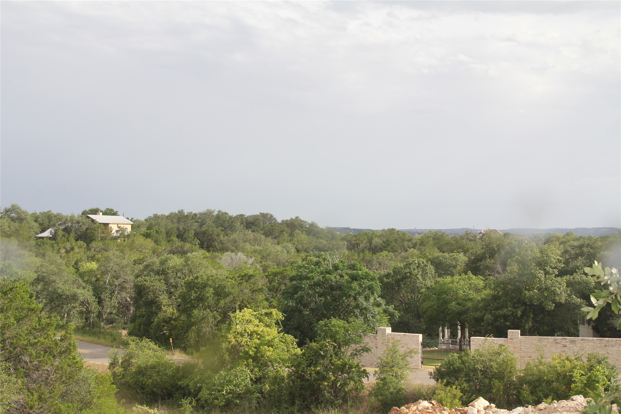 4715 Eck Lane Austin, TX 78734 - Photo 6 of 19 an aerial view of houses covered in trees