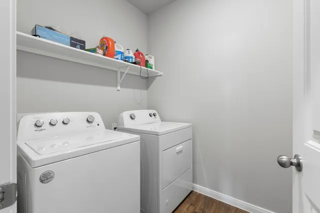 a utility room with dryer and washer